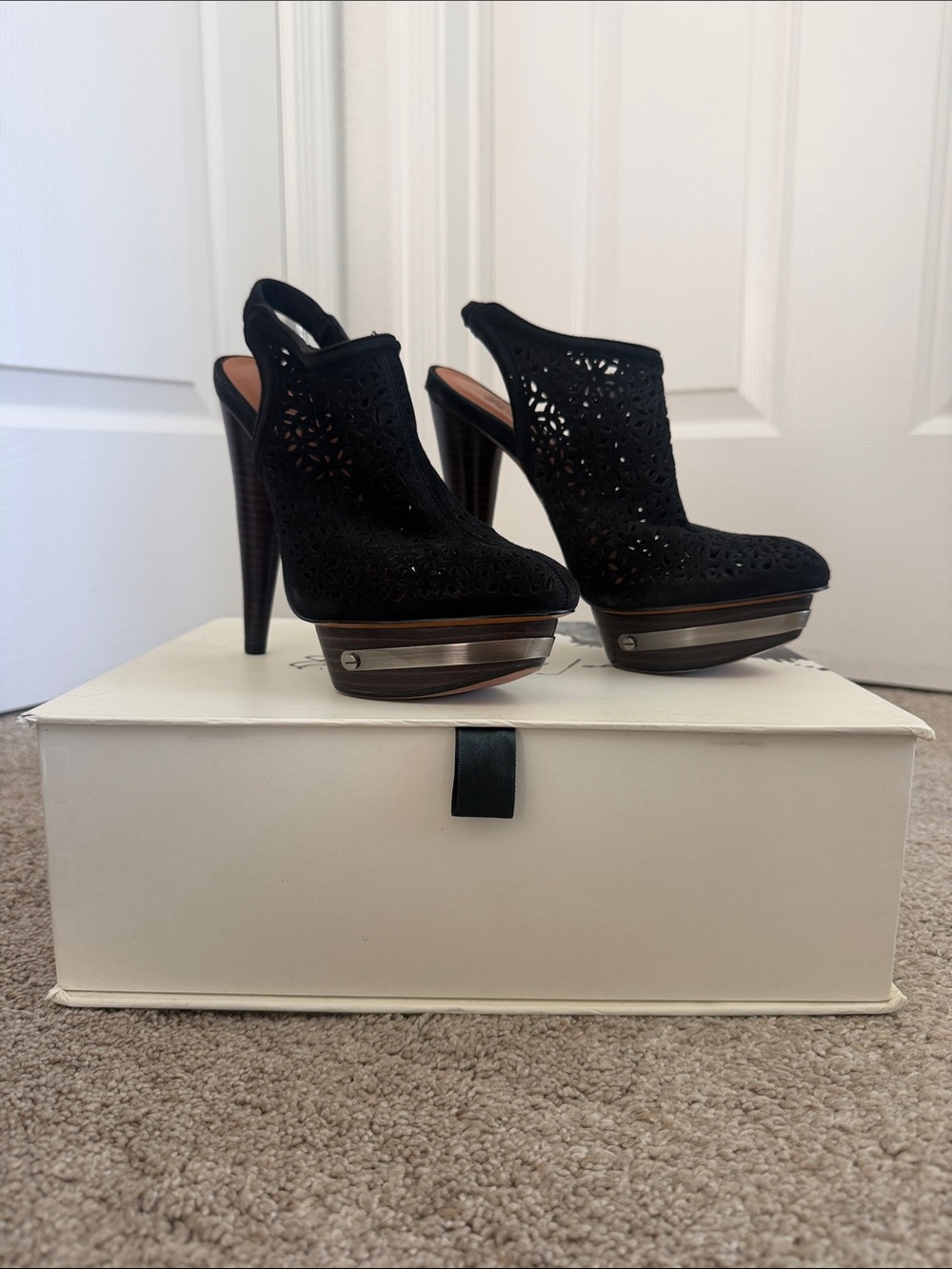 Elizabeth and James Black Laser-Cut Slingback Platform Heels